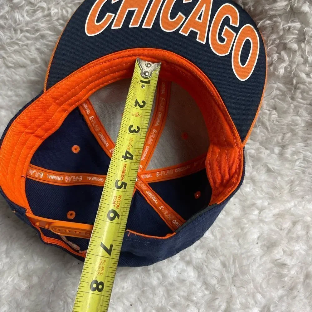 E-Flag Chicago snap back Navy Blue and orange cap adjustable back strap.